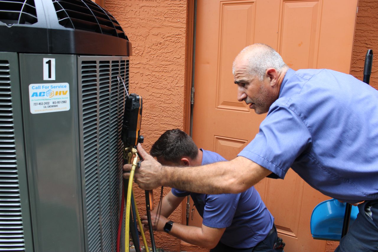 ACHV Team checking AC unit
